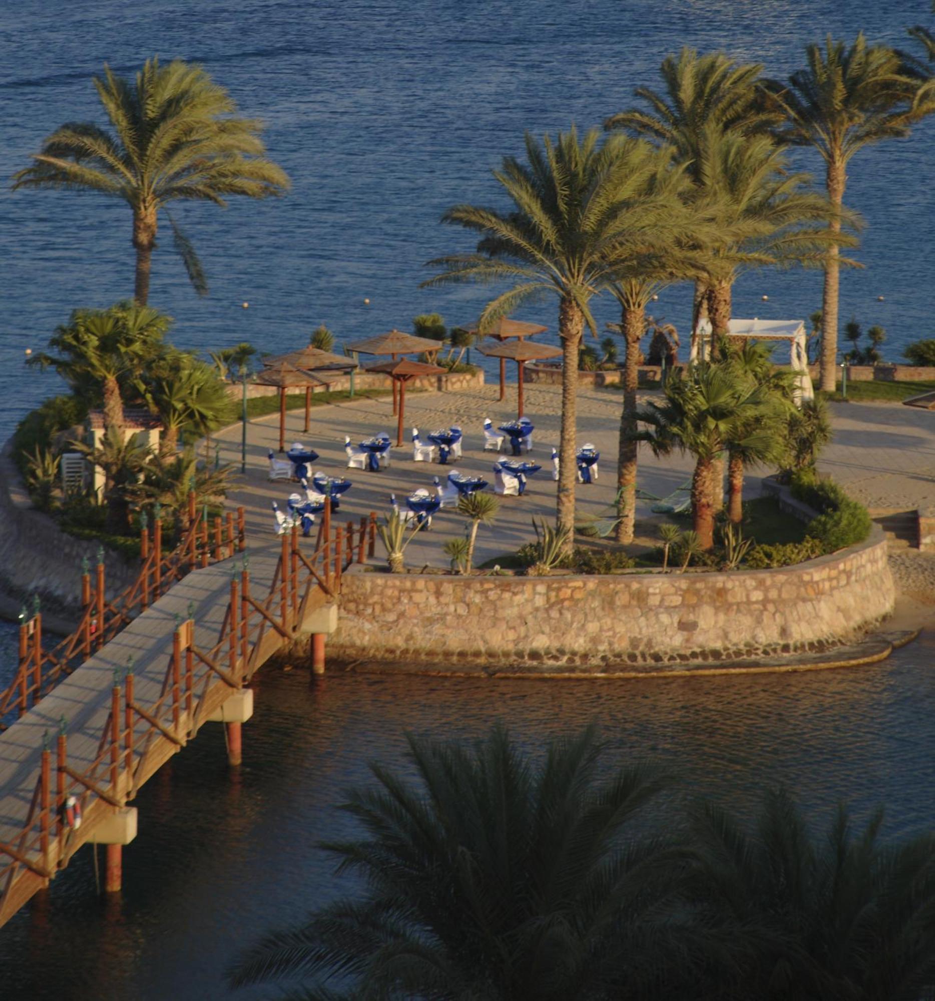 Hurghada Suites & Apartments Serviced By Marriott Exterior foto The beach at the Hilton Taba